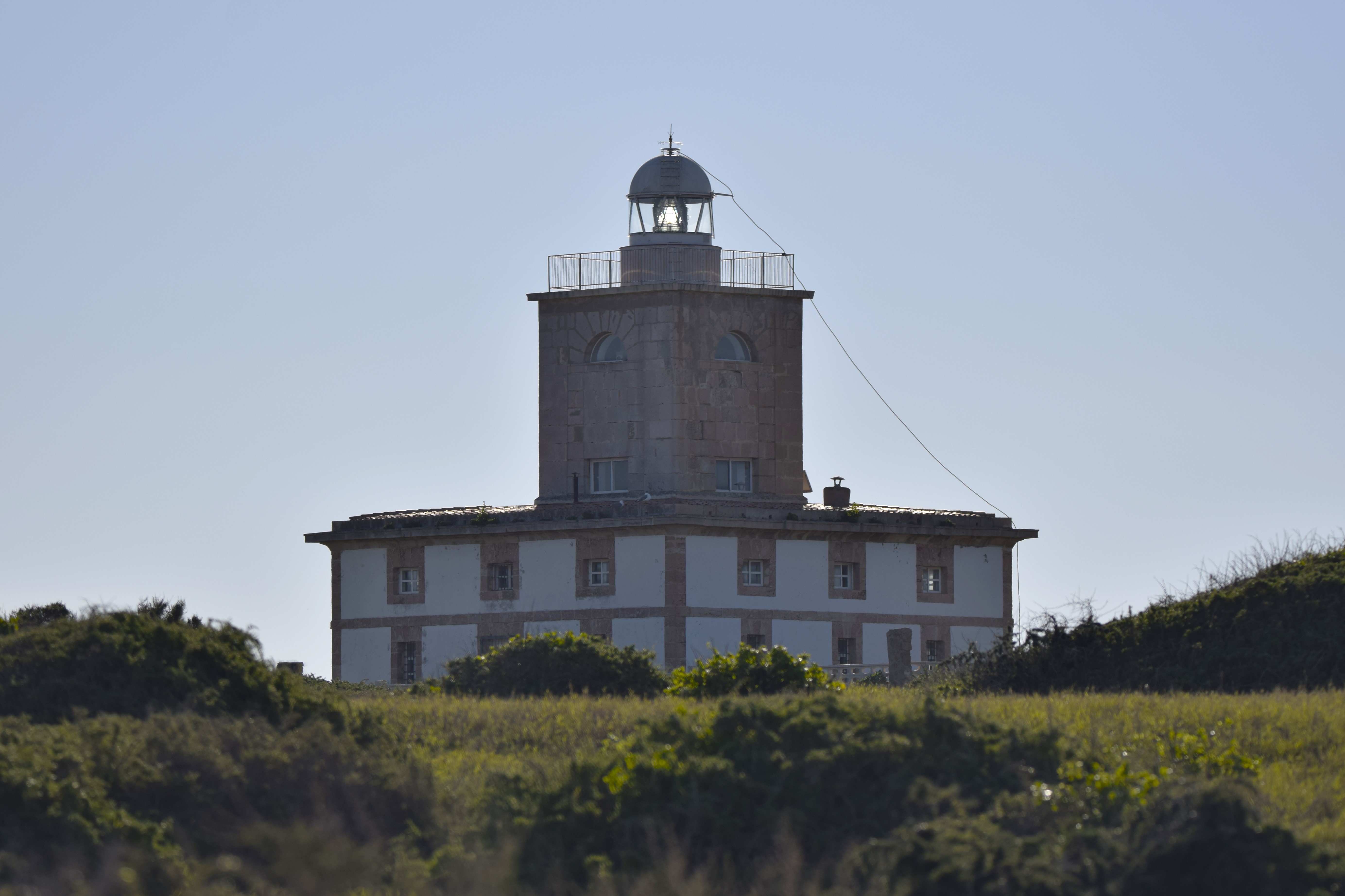 Tabarca Lighthouse, inaugurated in 1854, as viewed from the near the dock.