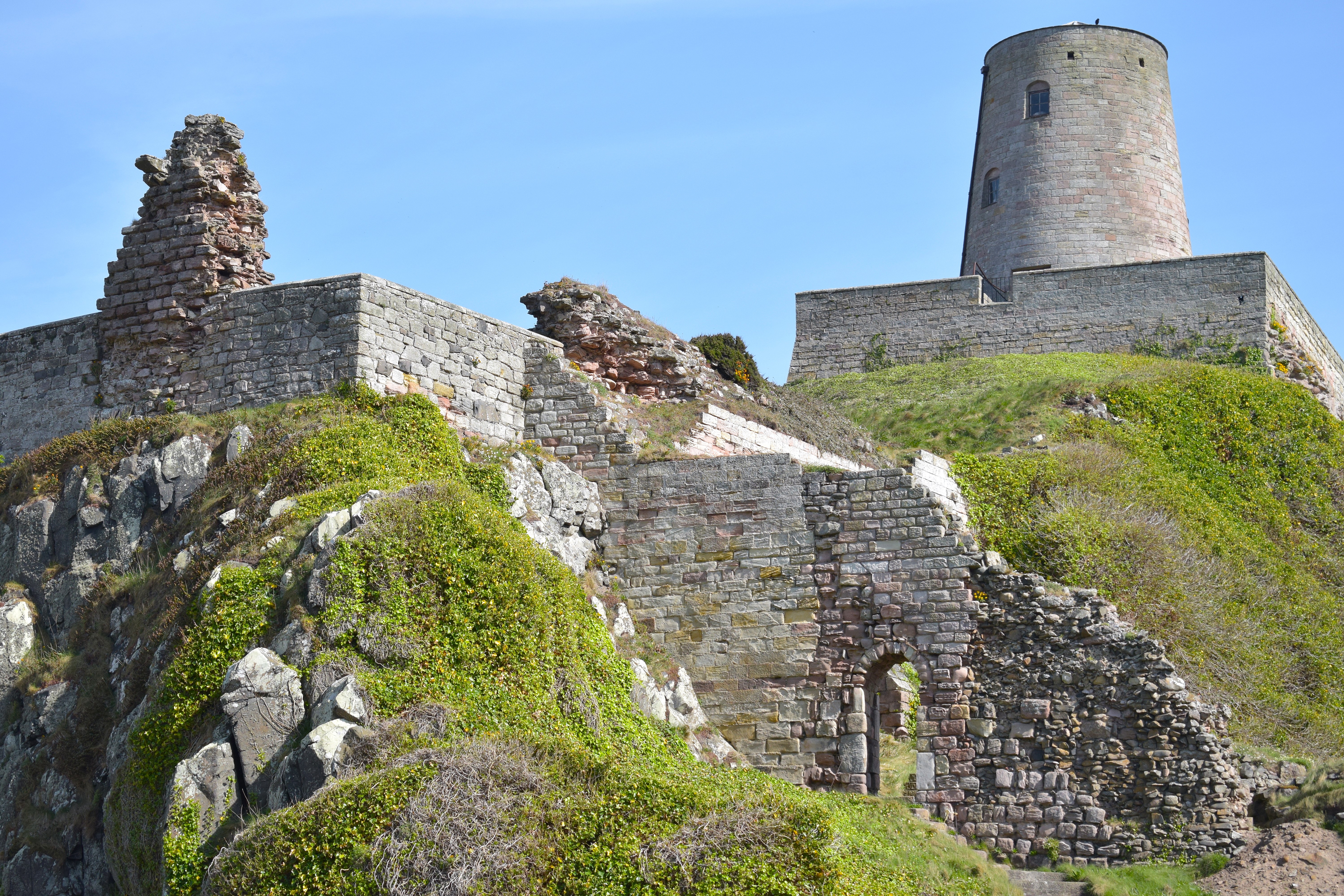 >The walls of Bamburgh Castle, built and rebuilt over the centuries