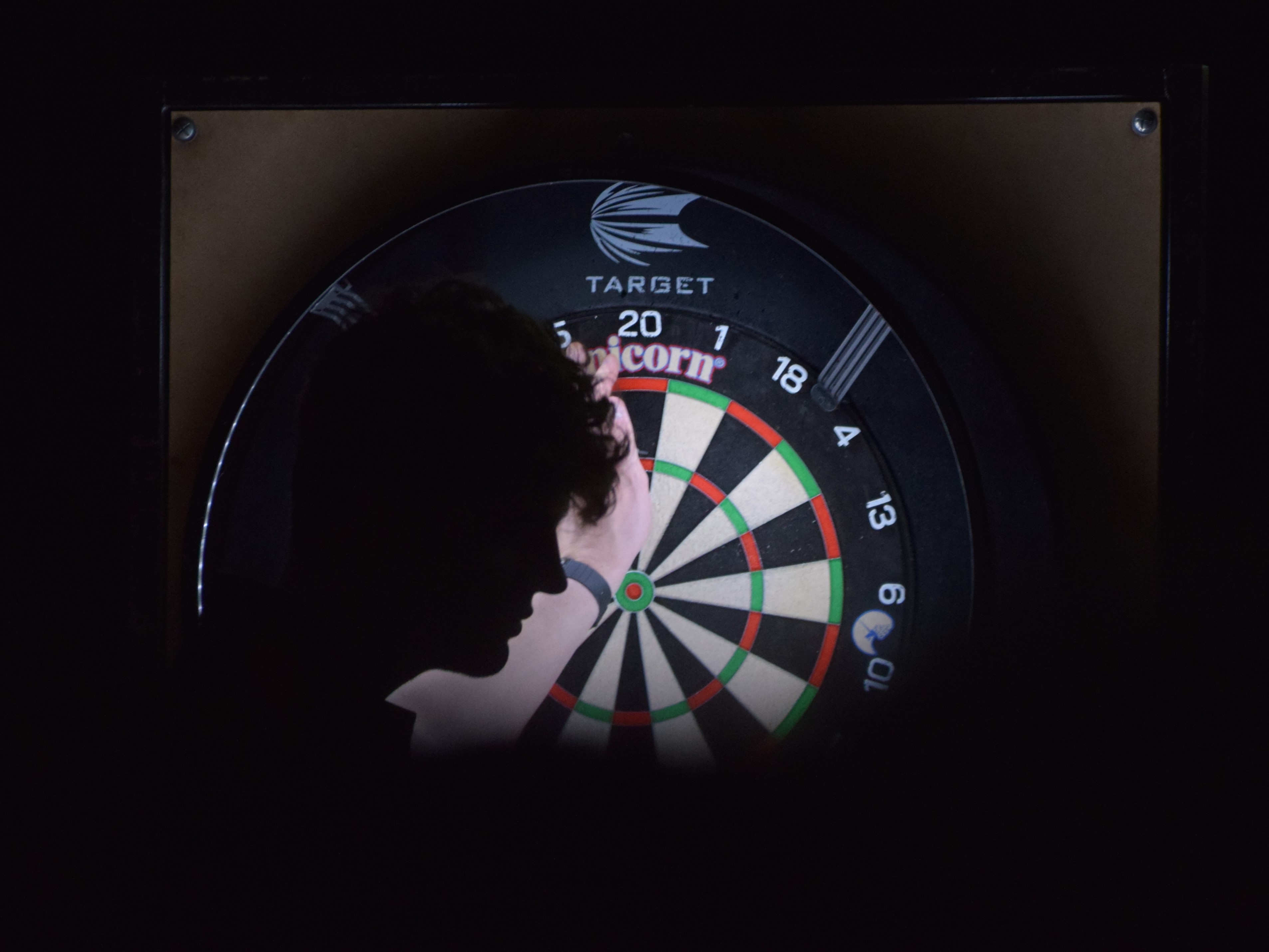 Darts player at the Roses Sports Tournament, York